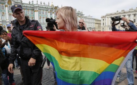 Russian President Vladimir Putin signs legislation marking the final step outlawing gender-affirming procedures
