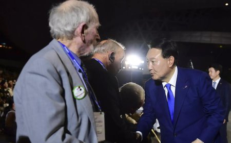 Russian, Chinese officials join Kim Jong Un at North Korea military parade