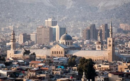 Syria says an Israeli strike that hit a Damascus residential area killed 2 people