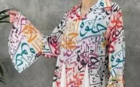 Woman in Arabic-script dress saved from mob in Pakistan