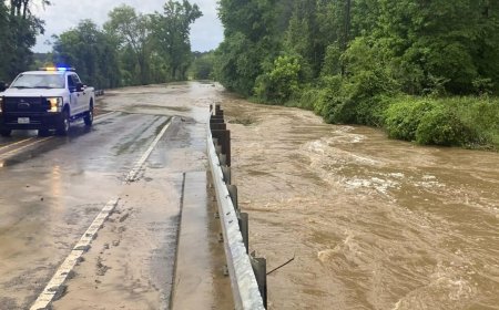 Heavy rains near Houston close schools and flood roadways as officials urge residents to evacuate